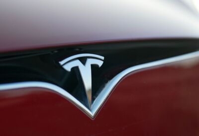 Close up shot of the Tesla Model S emblem