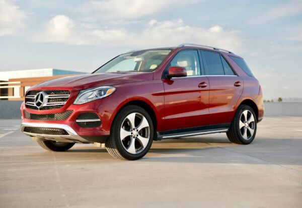 Medium wide shot of the Mercedes Benz GLE-Class vehicle facing left