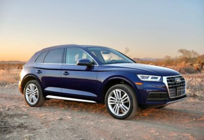 Medium side shot of an Audi Q5 from High Flying Rentals.