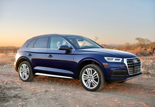Medium side shot of an Audi Q5 from High Flying Rentals.