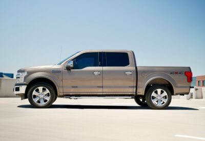Medium wide shot of the Ford F-150 with the vehicle facing left