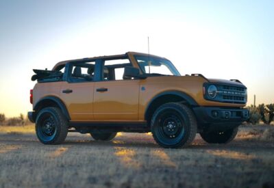 Ford Bronco glory shot with light streaming through facing right