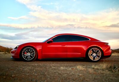 wide side shot of the Porsche Taycan facing left