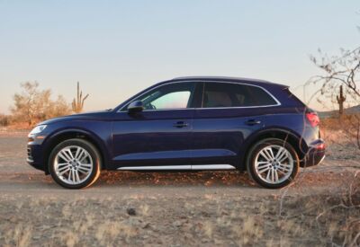 A side shot facing left of the Audi Q5 from High Flying Rentals.