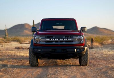 Frontal medium shot of the Ford Bronco with mountains in the background