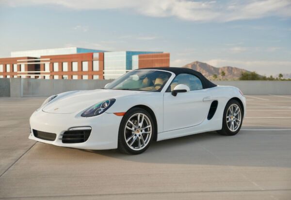 Medium wide front angle shot of the Porsche Boxster facing left