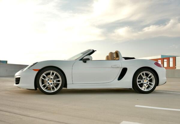 side wide shot of the Porsche Boxster facing left.