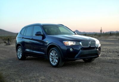Frontal angled shot of the BMW X3 facing right.