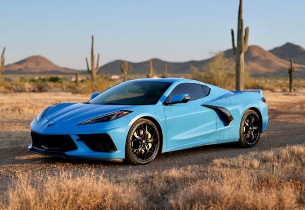 Medium wide shot of the Chevrolet Corvette with mountains in the background.
