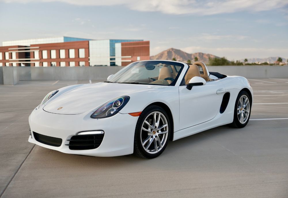 front angle shot of the Porsche Boxster in the city