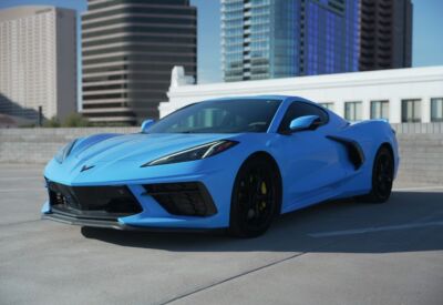 A Chevrolet Corvette in a medium wide shot with the car facing left.