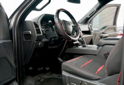 Interior shot of the Ford F-150 showcasing the front seat on the driver's side