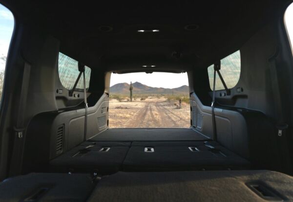 Interior shot of the Chevrolet Suburban back seats with extra room.