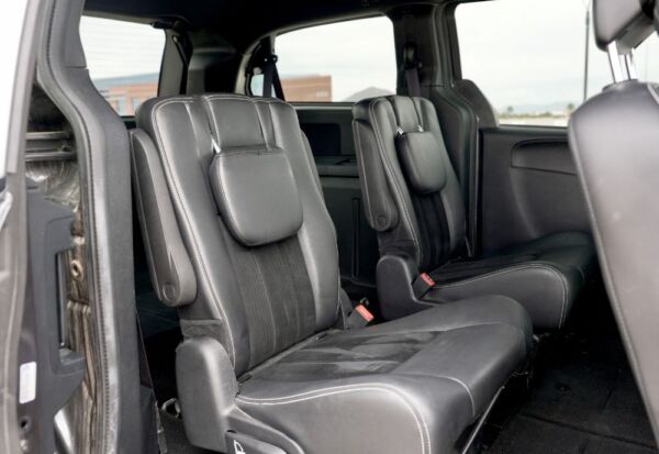 Side interior shot of the Dodge Grand Caravan showcasing the comfortable seating