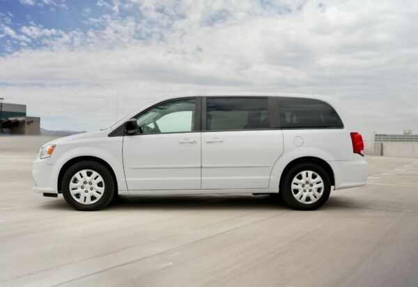 Wide side shot of the Dodge Grand Caravan facing left.