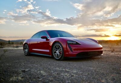 front angle shot of the Porsche Taycan facing right