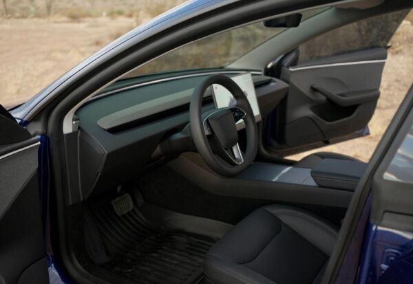 Interior shot of the Tesla Model 3 drivers side