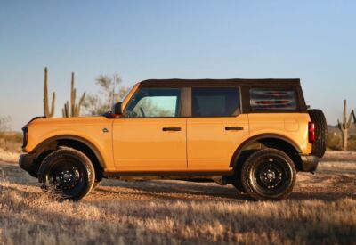 Medium wide shot of the Ford Bronco with desert in the background