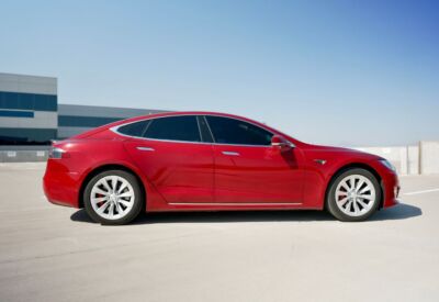 wide side view of the Tesla Model S facing left